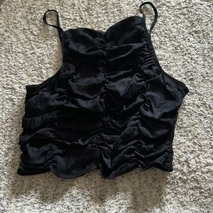 H&M spaghetti strapped top with a stretchy fit.